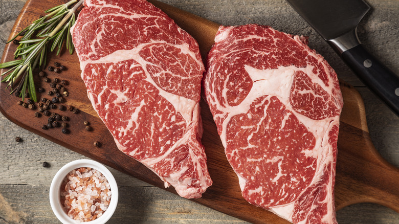 Wagyu steaks on a cutting board ready for preparation