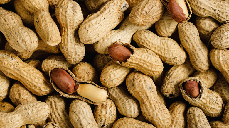 Peanuts, some shelled, in pile