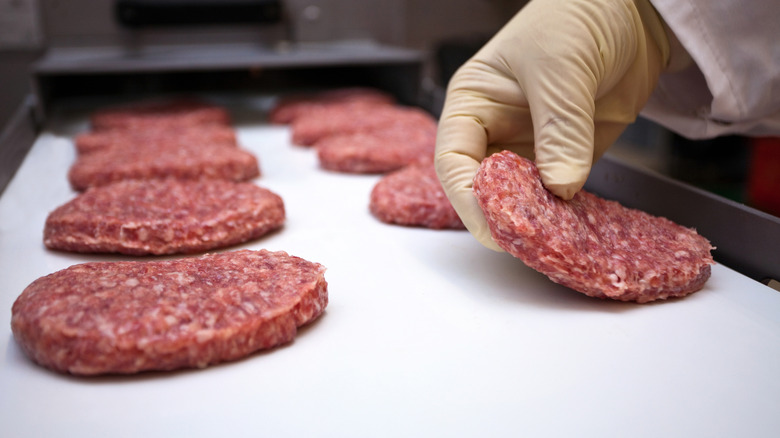 ground beef patties in production line