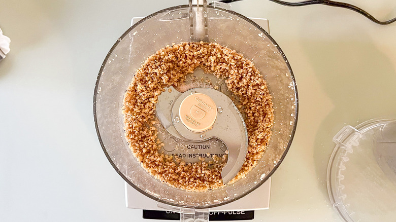 Chopped walnuts in food processor