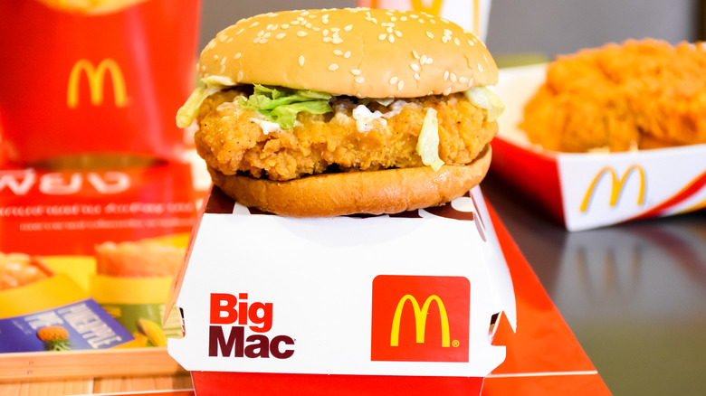 McDonald's spicy chicken sandwich on top of a box that says Big Mac.