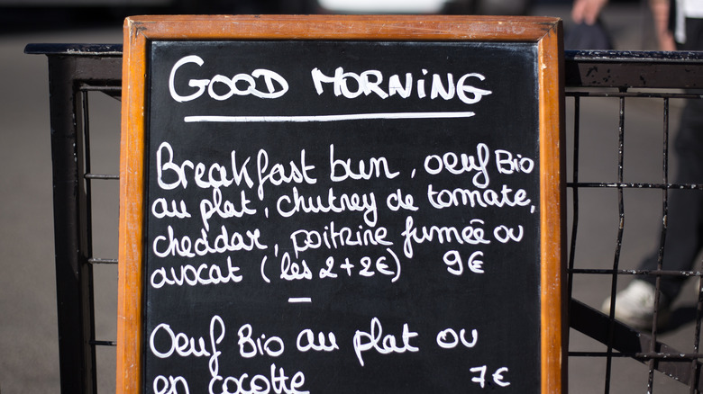 A handwritten menu in Paris, with both English and French.