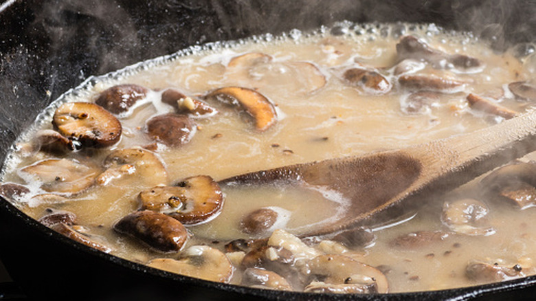 cream of mushroom soup bubbling and reducing