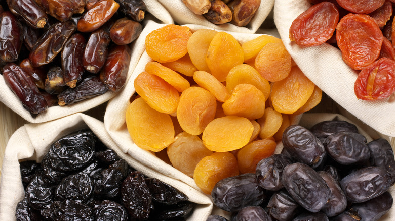various dried fruits in containers