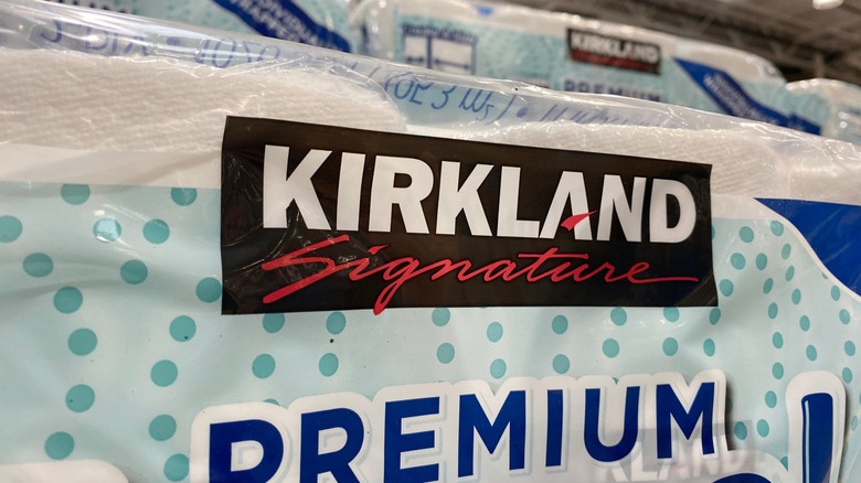 The Kirkland Signature logo on a pack of paper towels