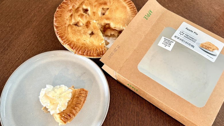 Freshness Guaranteed apple pie slice and whole pie with box