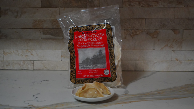 Trader Joe's Chicken Gyoza Potstickers on a marble countertop.