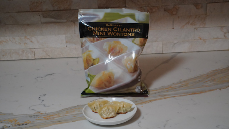 Trader Joe's Chicken Cilantro Mini Wontons on a marble countertop.