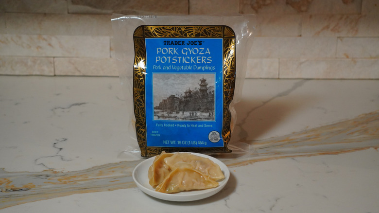 Trader Joe's Pork Gyoza Potstickers on a marble countertop.