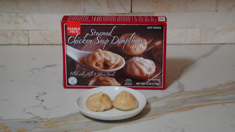 Trader Joe's Steamed Chicken Soup Dumplings on a marble countertop.