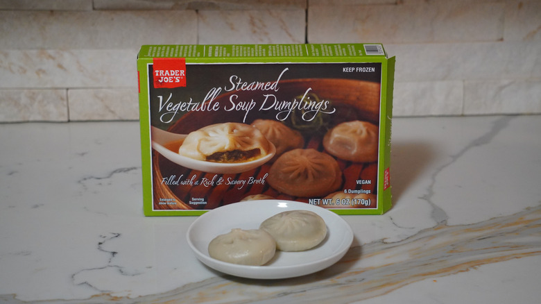 Trader Joe's Steamed Vegetable Soup Dumplings on a marble countertop.