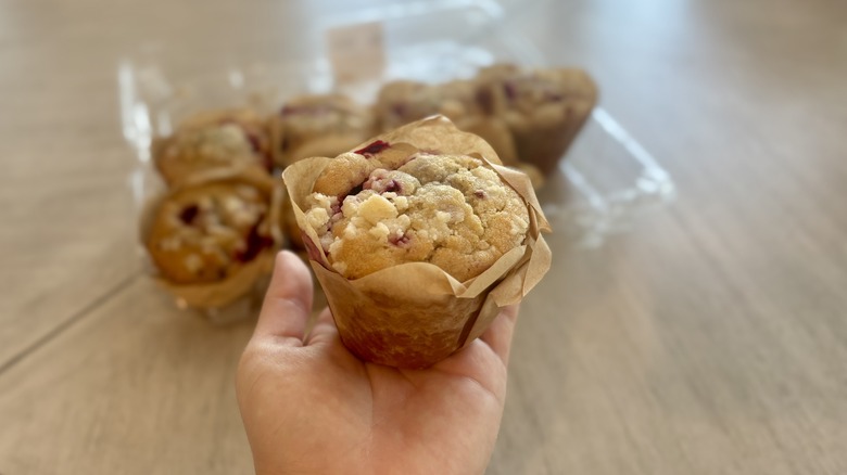 holding Lemon Raspberry muffin