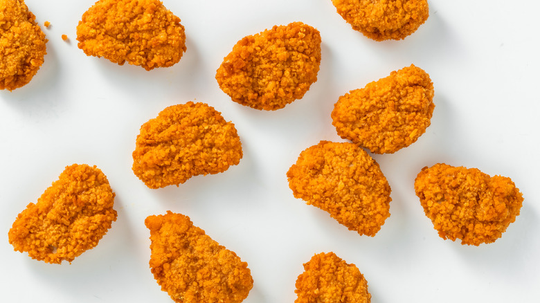 chicken nuggets photographed on white background