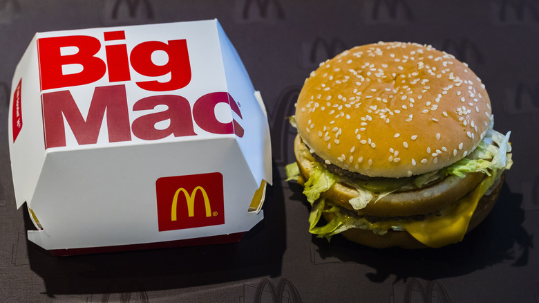 A Big Mac next to its box.