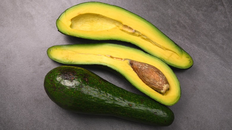 Long-neck avocado sliced open