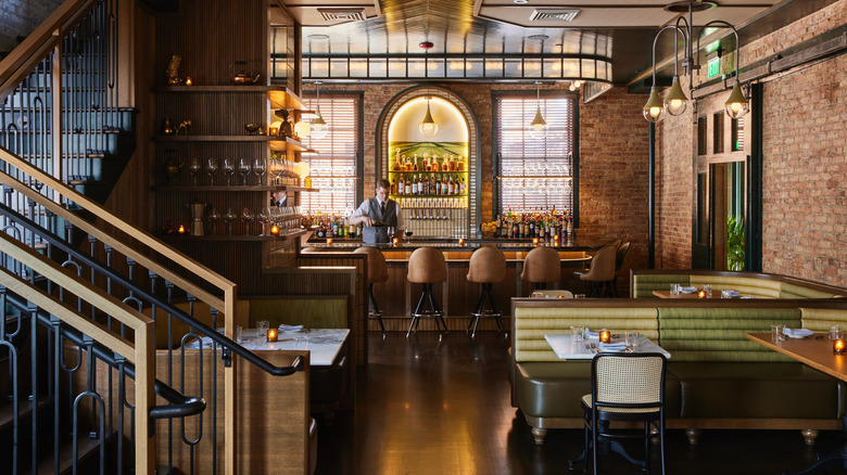 A bartender tends the bar in Harvey House, a famous supper club in Wisconsin.