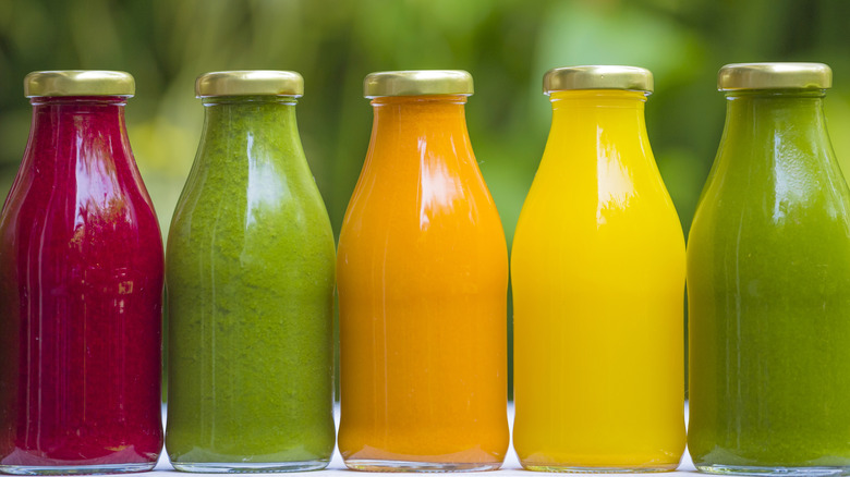 cold-pressed fruit and vegetable juices in glass bottles