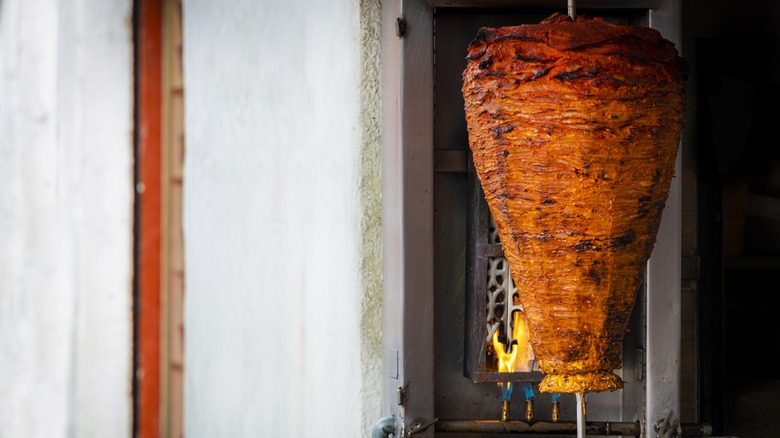 pork al pastor roasted in vertical spit