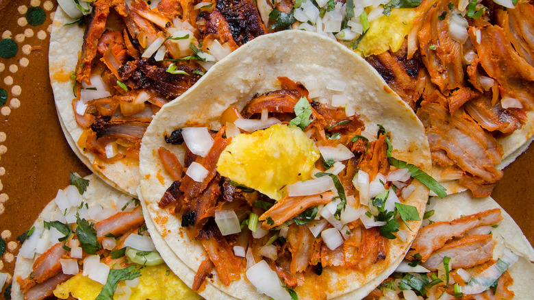 platter of tacos al pastor