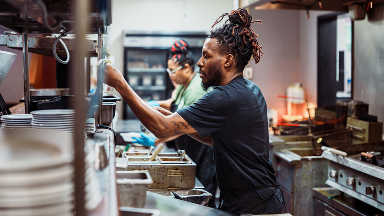 Chefs in a restaurant kitchen.