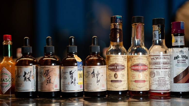 A wide variety of bitters lined up next to each other