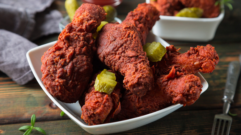Nashville hot chicken legs with pickles