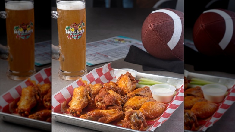A photo of a shrimp dish at Hogan's Hangout, with a toy Hulk Hogan surfer action figure in the background