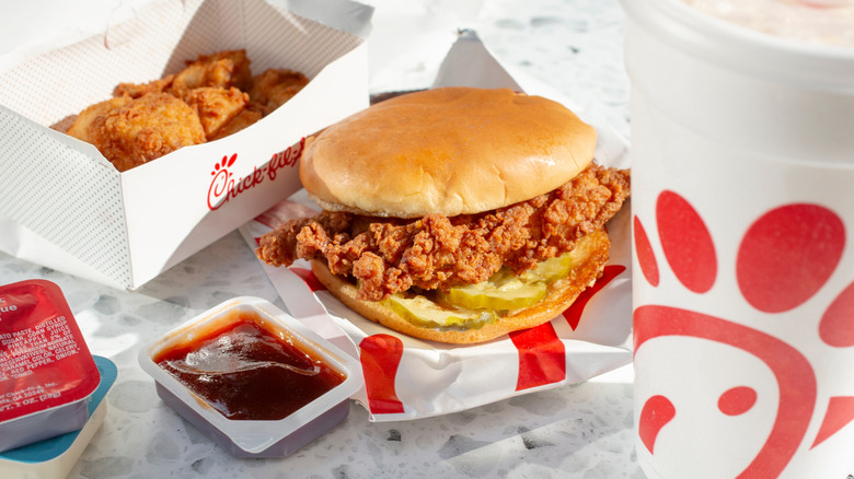 Chick-fil-A chicken sandwich and chicken nuggets in a branded cardboard box