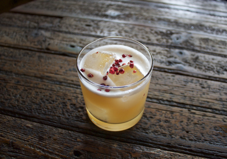 The Falcon Lake Incident maintains the Jungle Bird's frothiness and brightness but adds bite from pink peppercorns and floral overtones from chamomile syrup.