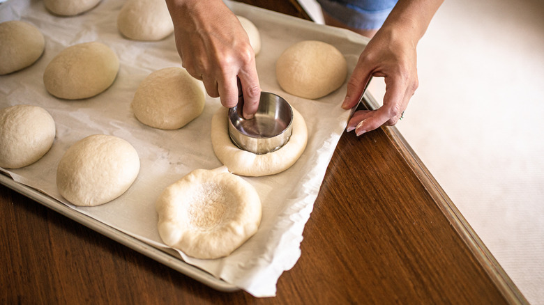 baker making bialys