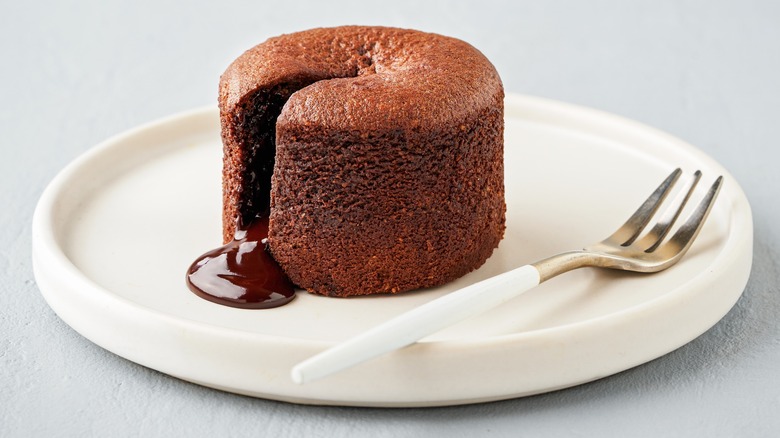 Chocolate molten lava cake on white plate