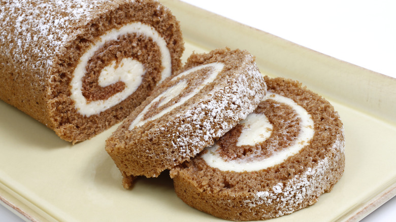 Rolled cake sliced on a platter