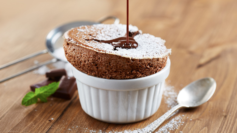 chocolate soufflé in white ramekin