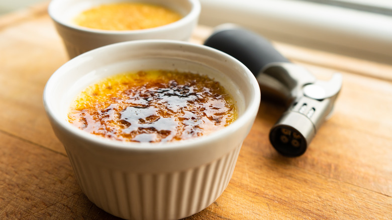 close up of creme brulee in white ramekin