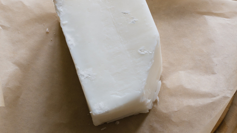 chunk of beef tallow on brown paper