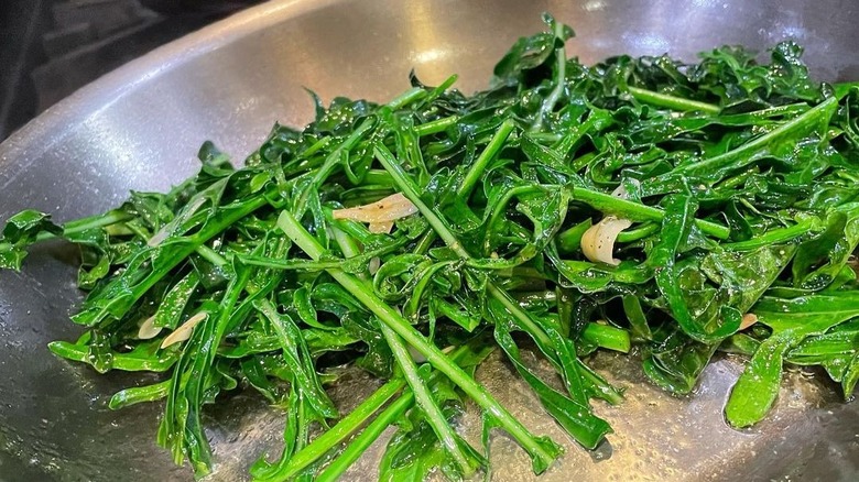 Wilted broccoli spigarello in pan