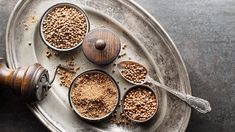 Silver tray with coriander and spice grinder