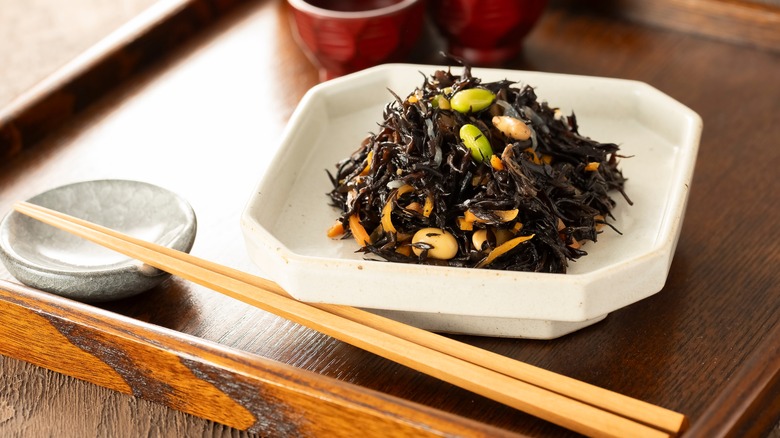 hijiki salad served with chopsticks
