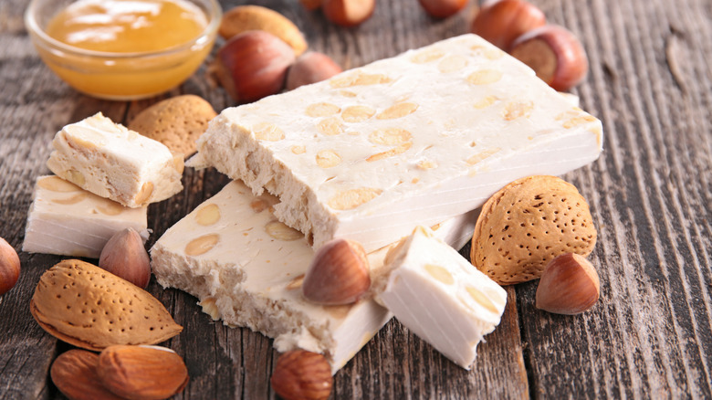Block of white nougat with nuts and honey