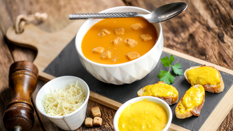 Fish soup with rouille on toasted bread