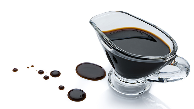 pitcher of balsamic vinegar with thick drops