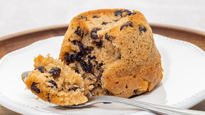 spoon scooping up spotted dick