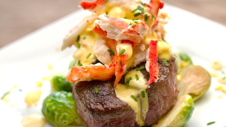 Steak Oscar on top of Brussels sprouts