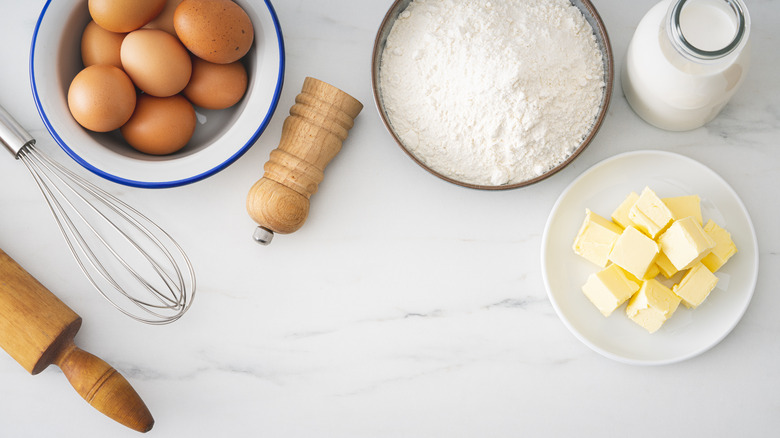 baking ingredients and tools laid out on table