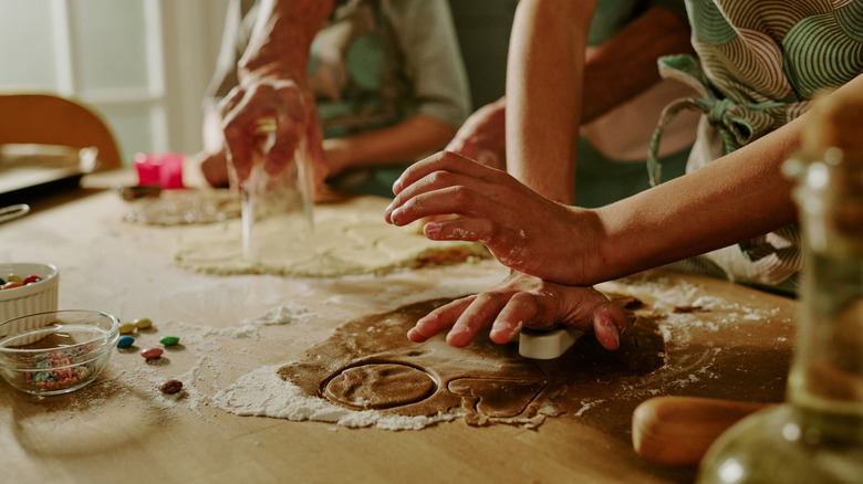 family baking cookies together