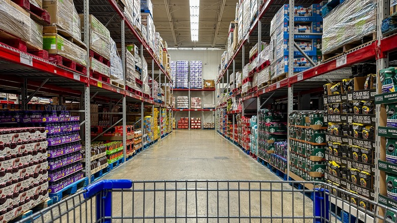 Cart driving down a food aisle at Sam's Club