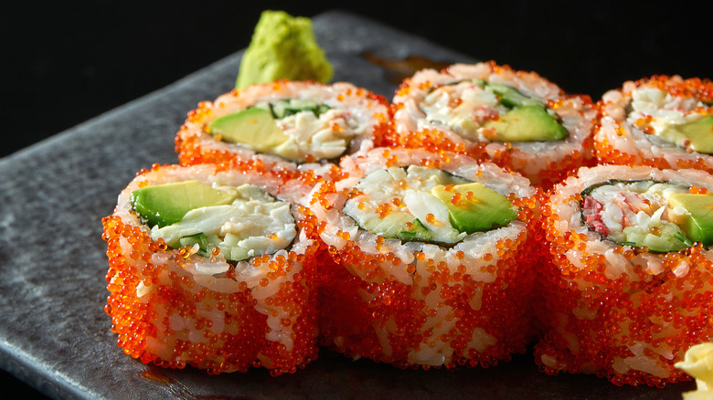 Pieces of sushi covered in tobiko