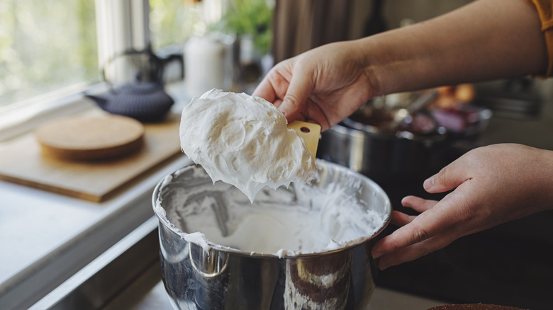 Making whipped cream in home kitchen
