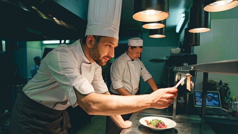 chef checking an order ticket