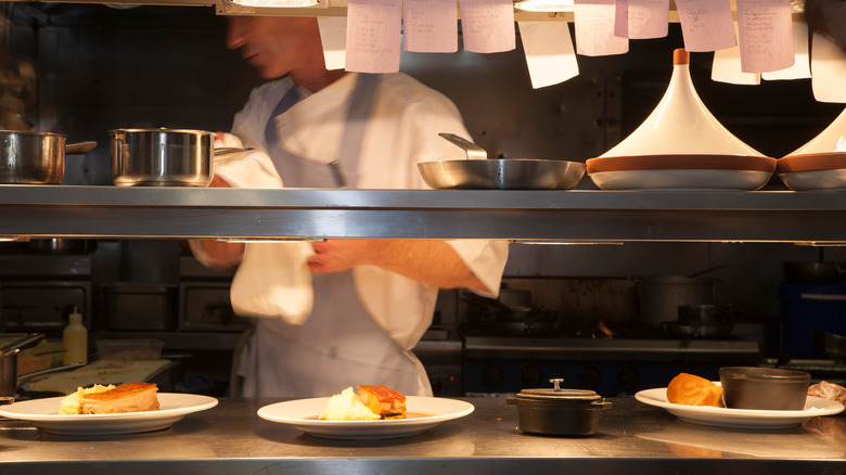 prepared dishes on pass at restaurant